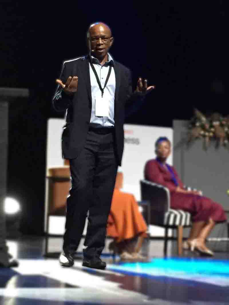 Rapula Modibane addressing a conference audience